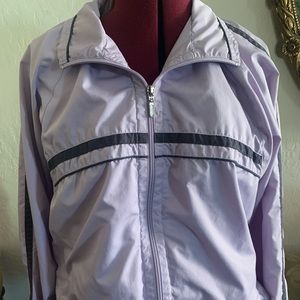 EUC Champion windbreaker.Purple w/dark purple trim. Size L. Has 1 small blemish